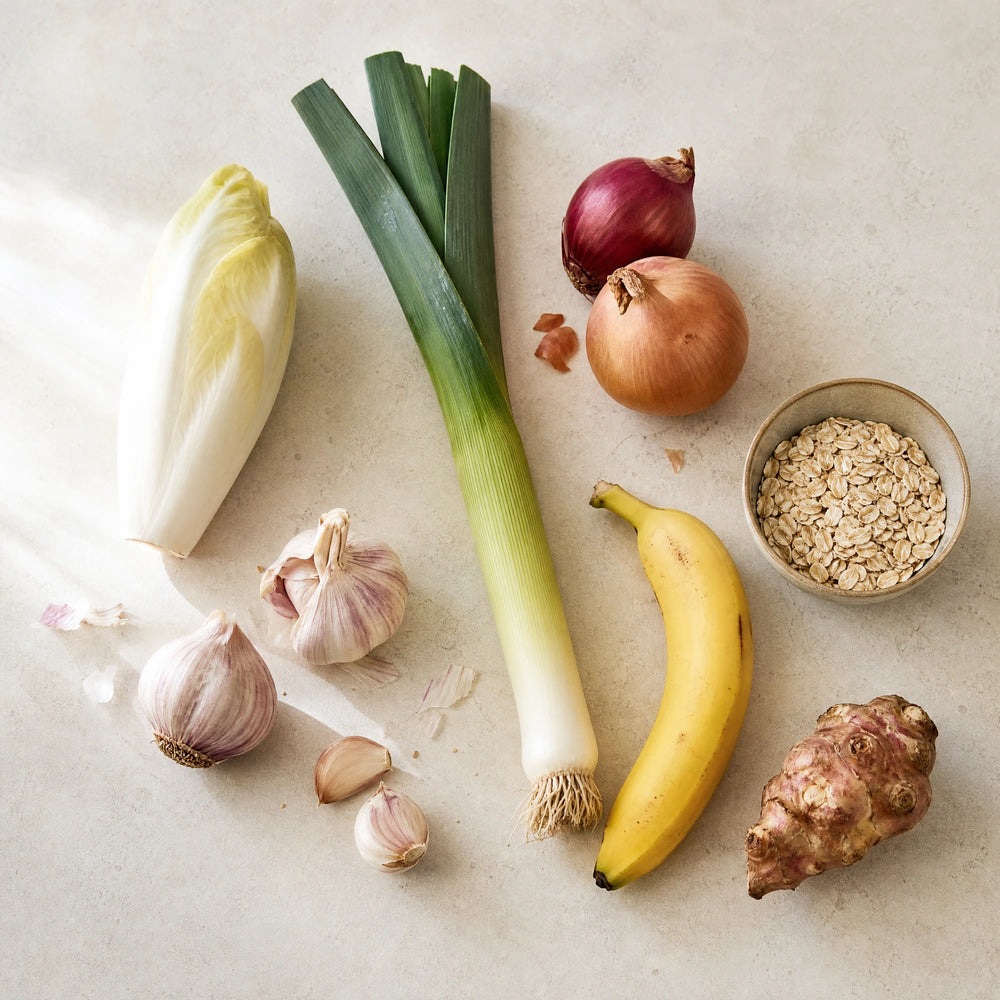 Präbiotische Lebensmittel: Chicorée, Lauch, Zwiebeln, Knoblauch, Hafer, Banane und Topinambur